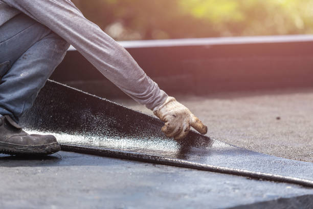 Professional Emergency Waterproofing technician working in Warrington, PA